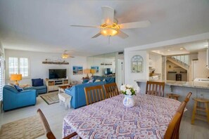 Dining table off kitchen and living room