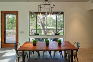 Large dining table seats 10 with a view of the lake