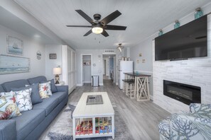 This comfy living room offers space for everyone to gather!