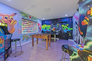 Level up your leisure in our trendy game room.