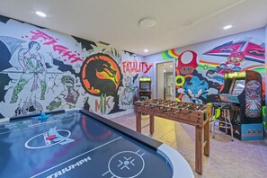 Elevate your downtime with the luxury and amazement of our trendy game room.
