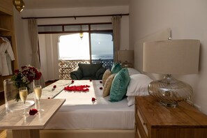 Master Bedroom -Located on the upper floor.Full views of the Ocean