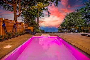 Dive into luxury in our heated pool with enchanting lights.