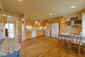 View of Kitchen and Dining Room from Entrance Oreq-B-134