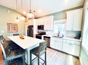 Extra large quartz island bar for cooking, dining, game playing