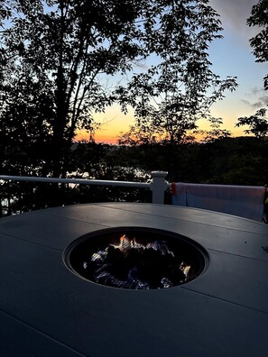 Lakeside evenings come alive around our cozy fire pit, blending warmth with
breathtaking views