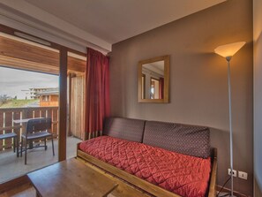 Unwind in our comfortable living room after a day full of adventures.