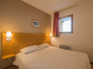 Experience a peaceful night's sleep in our tranquil and cosy bedroom.