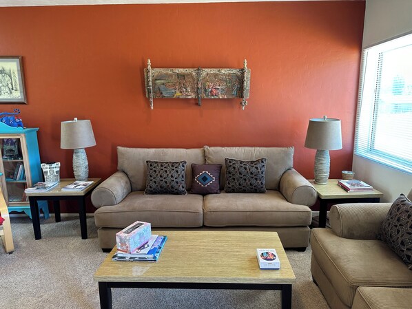 Living room with queen sleep sofa