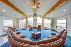 Living Room | Fireplace | Picture Windows | Piano | Acoustic Guitar