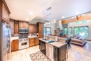 Luxury kitchen with gourmet appliances and granite countertops