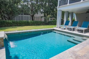 Heaven on Earth features a private pool with patio in the backyard.