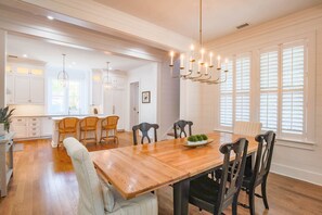 This gorgeous, custom built home features shiplap walls, oak hardwood flooring and ten foot ceilings.