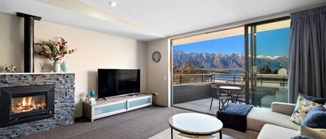 Overlooking living area with a fireplace