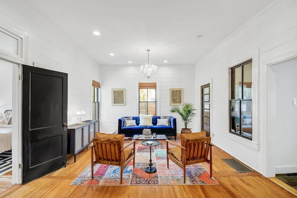 Relax in our cozy vintage living room w/ ample seating options & a smart TV.
