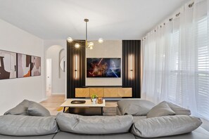 Relax and enjoy the cozy ambiance of our spacious family room