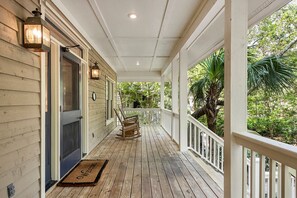 Relax on the rocking chairs on the front porch after a long day of activities.