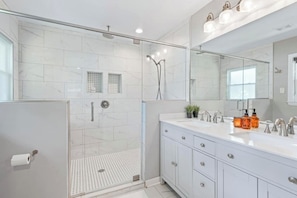 This spa shower is perfect for a long shower. Can you imagine being in here?
