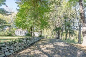 Enter this magical retreat through a charming stone wall entry