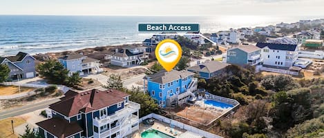 A nearby beach access is located just a few houses down! Your toes will be in the sand in no time!