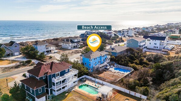 A nearby beach access is located just a few houses down! Your toes will be in the sand in no time!