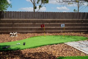 Enjoy a game of corn hole and mini golf