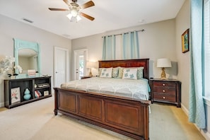Master bedroom with new, comfortable king bed, ensuite bathroom, private 2nd floor balcony.