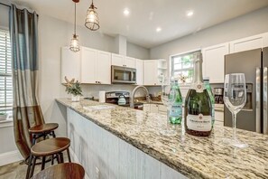 Kitchen island seating for 4 guests.