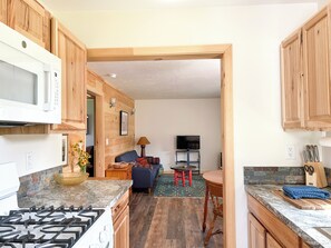 Kitchen with through view to living room