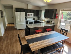 Spacious kitchen area, stocked with all the essentials