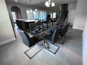Indoors, Floor, Furniture, Dining Room, Dining Table