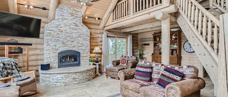 Mt Quandary Retreat - a SkyRun Breckenridge Property - Great Room w/ Fireplace, Comfortable Seating, and Games