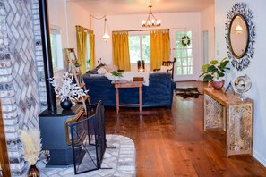 fireplace between living room and dining room