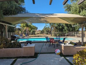 Pool Patio, grill, outdoor dining table