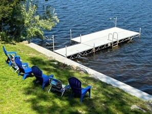 Adirondack and beach chairs provided, looking out on your private dock.