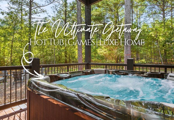 Enjoy a soothing soak in the hot tub, surrounded by nature.