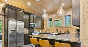 This modern kitchen is fully equipped and ready for your culinary adventures.