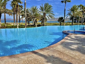 Infinity pool, swim ip bar area and Restaurant. 