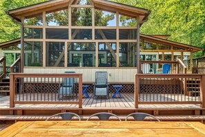 Bilevel deck off back of house and screened in deck area