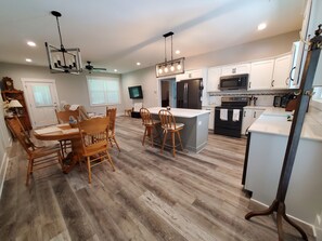 Rear entrance into kitchen and dining area