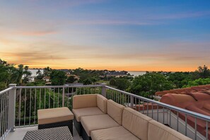 Sapphire Shore's upper-deck crows nest features incredible sunsets over the bay!