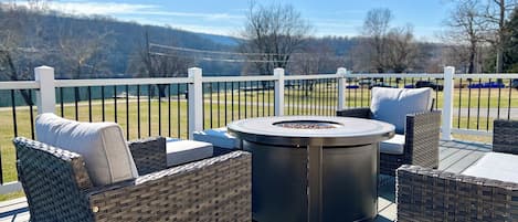 Deck with Fire Table and River View