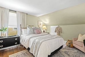 Master Bedroom is both charming and luxurious. You won't want to leave after snuggling up in this queen bed