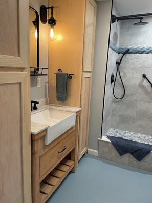 Newly remodeled (June, 2024) bathroom with step in shower
