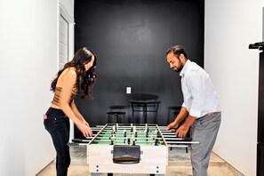 Level up the excitement in our game room where friendly competition meets fun