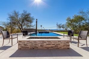 Firepit outside the back door of main home