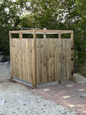 Outdoor shower next to the pool