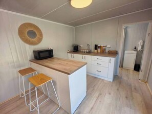 Our Kitchen with Stove Plates, Toaster Oven, Espresso Machine and More