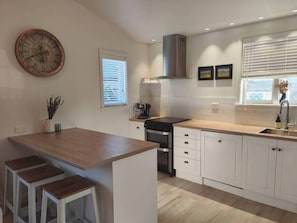 Kitchen With Integrated Dishwasher, Double Oven and Gas Stove Top