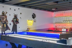 Its not just theatre and game room, it could be a complete set up to enjoy your favorite sports game and your favorite drink at our wet bar